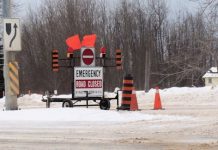 High winds and snow squalls close roads and schools throughout region